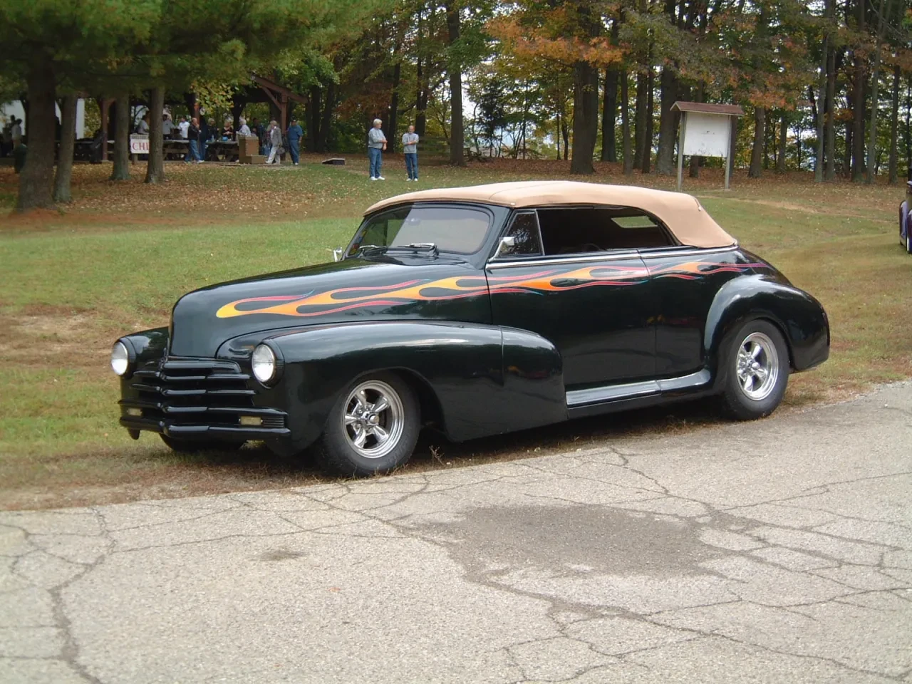 Black vintage convertible with flame graphics