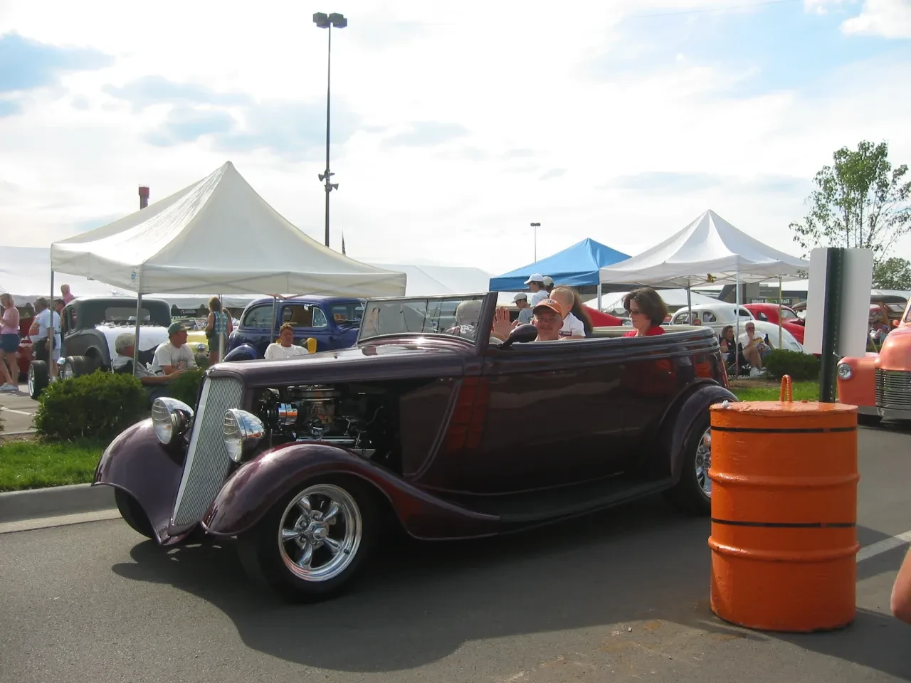 Purple convertible hot rod at car show
