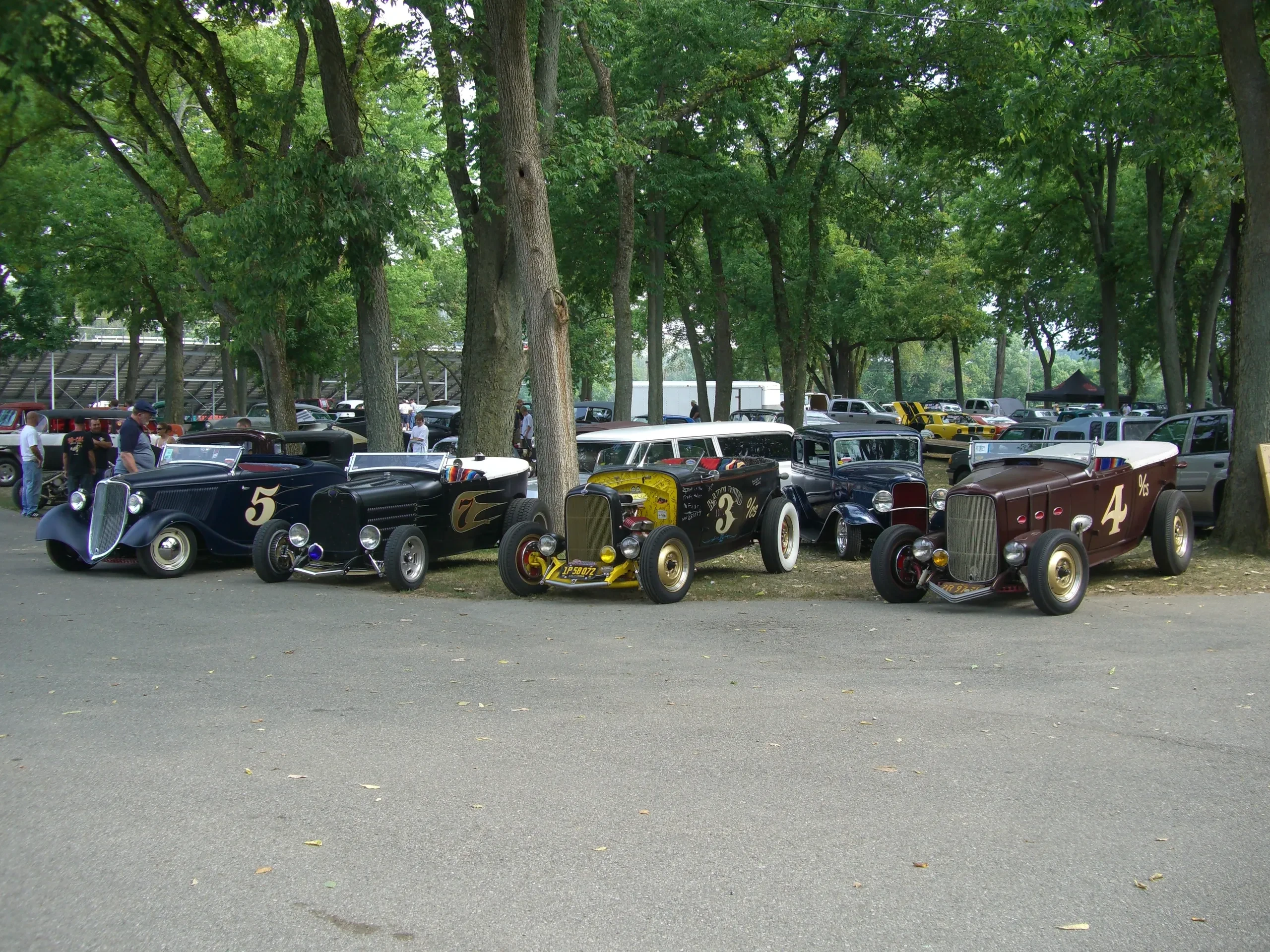 Vintage hot rods at an outdoor event